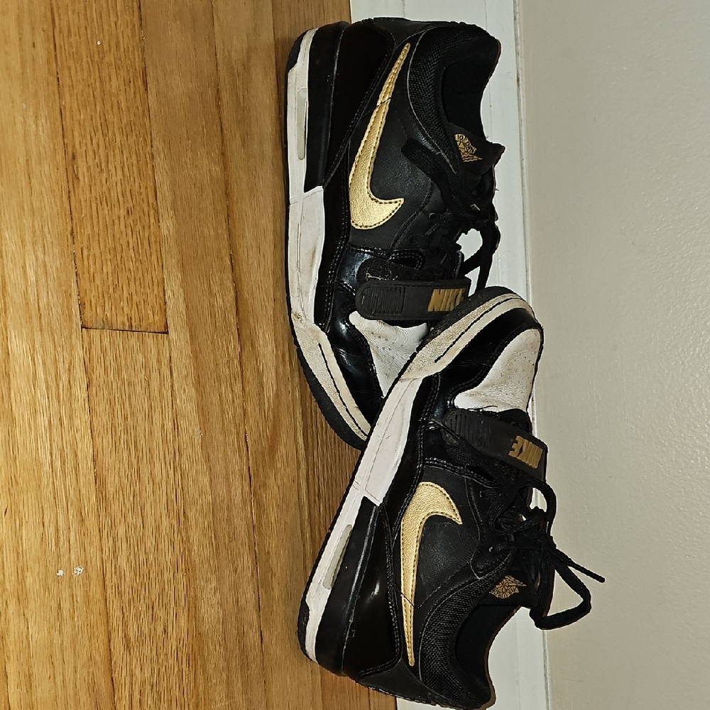 Nike Black and Gold Sneakers High-Top Design